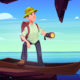 Traveler in boat explore rock cave on sea shore